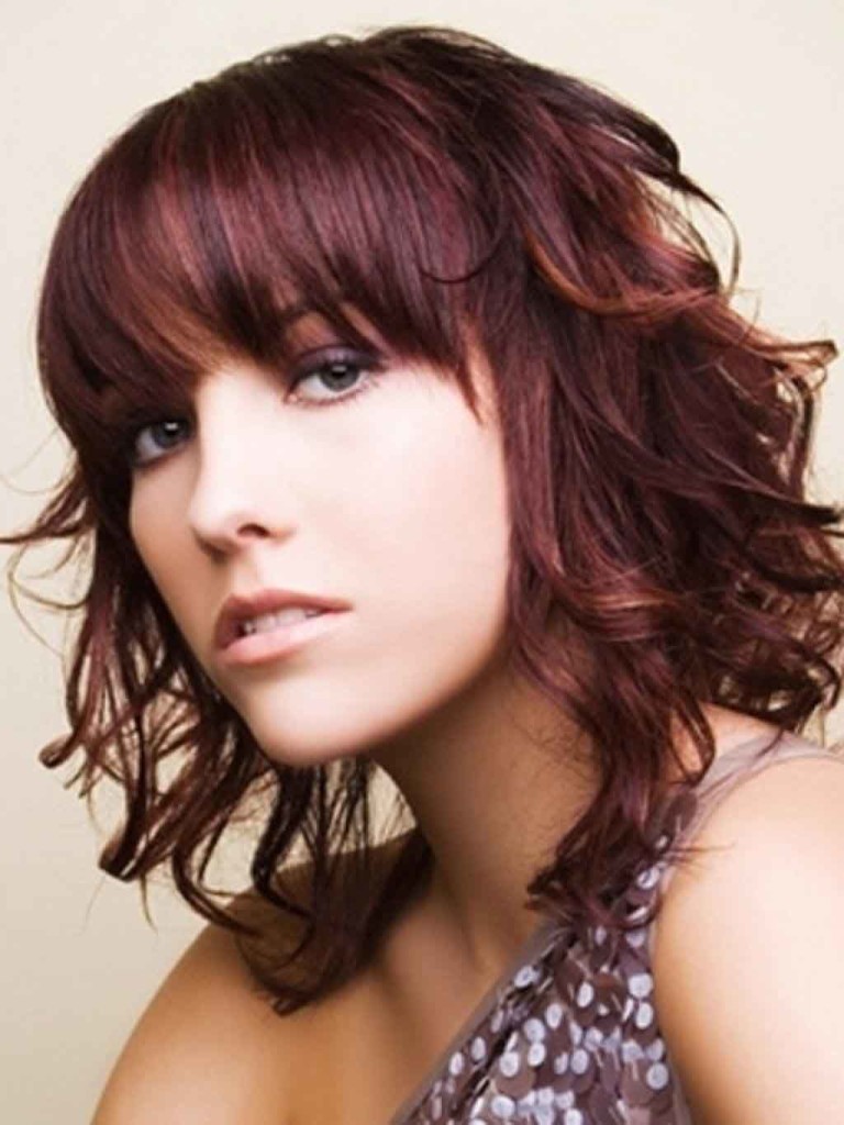 Highlighted Medium Length Curls with Bangs