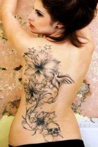 Tattoo with Bird, Skull & Flowers