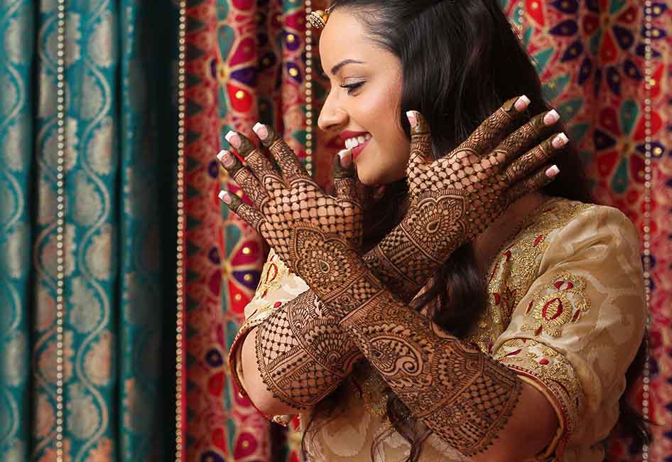 Inspired by the architecture of Rajasthan, this Mehendi style shows beautif...