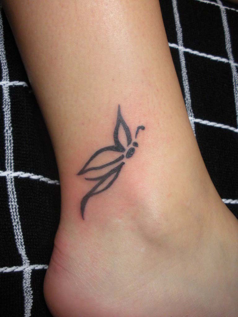 Small Tattoo On Leg