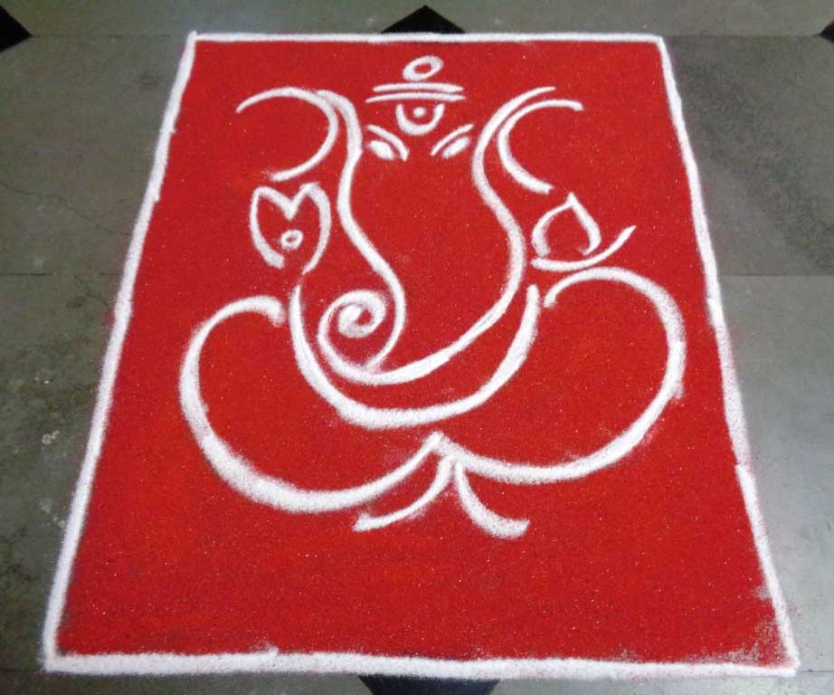 Red and white ganesh rangoli design