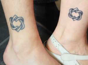 entangled hearts sister tattoo