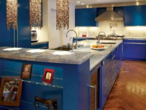 shiny blue kitchen with pendants