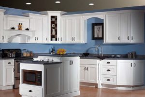 white kitchen cabinets with cool blue splash