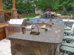 outdoor-kitchen-with-swimming-pool