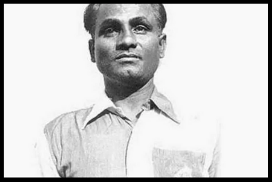 best hockey player major dhyanchand standing in white shirt