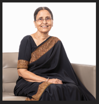 5th richest women manju d gupta sitting on sofa