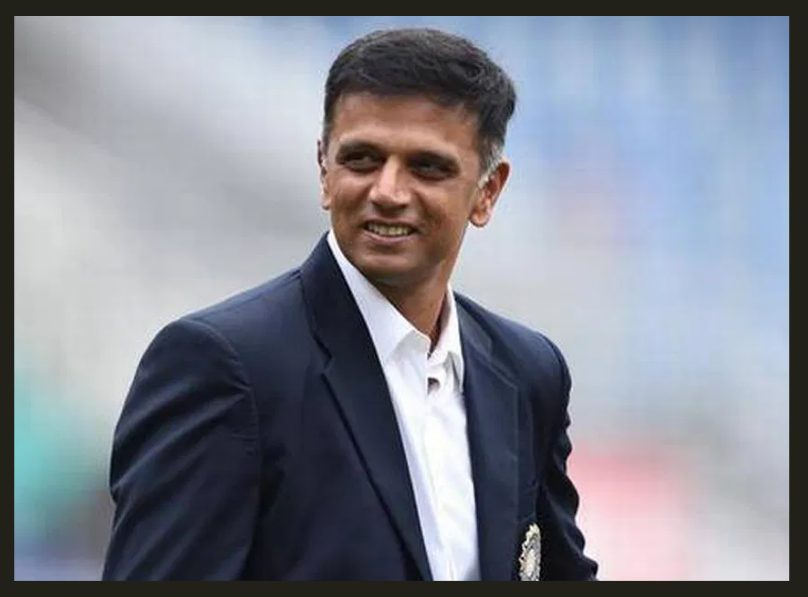 rich sportsperson rahul dravid in black coat and white shirt
